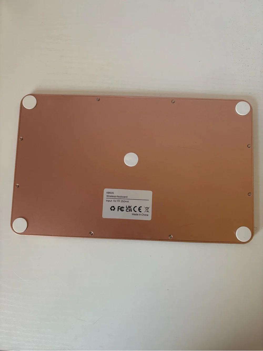 Compact Rose Gold Wireless Bluetooth Keyboard with White Keys